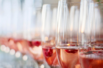 Glass of wedding champagne in the sun