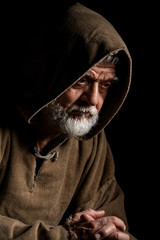 Christian medieval monk in prayer
