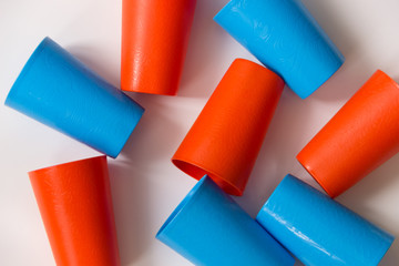 Plastic glasses on a white background. View from above..