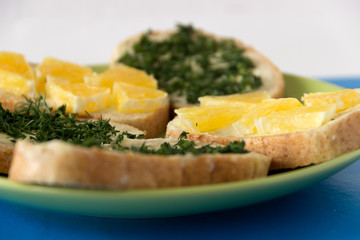 Sandwiches on a plate. Side view.