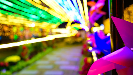 Blurre colorful night lights in park ,abstract image of Lunar New year festival. Christmas light background , party celebration concept.