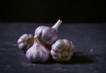 garlic on a dark background