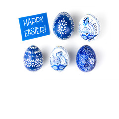 easter eggs with blue and white floral ornaments