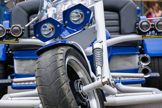 Uzhgorod, Ukraine - JUL 09, 2016: silverR trike detail shots. beautiful custom three wheel motorcycle in blue color