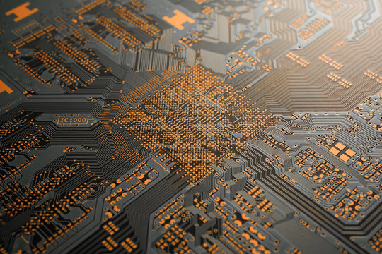 A close-up of black blank Printed circuit board (PCB) with no component mounted (copper exposed)