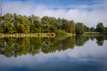 Fototapeta na wymiar Hrase pond lake in summer morning