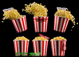 Set of buckets with popcorn and 3D glasses isolated on black background
