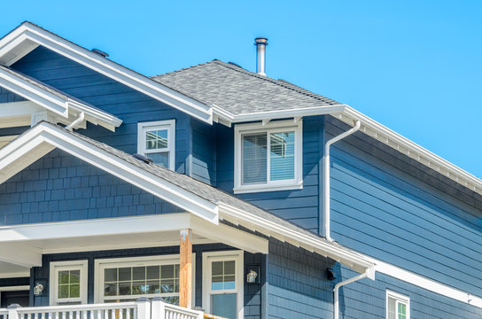 The roof of the house with nice window.