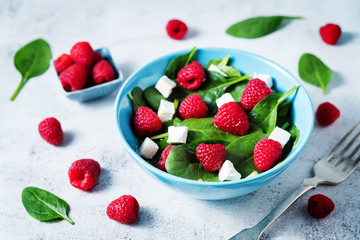 Spinach raspberry Feta salad in a bowl