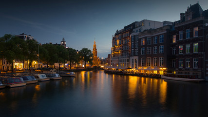 The evening center of tourist Amsterdam lights the lights, soft light and rich color.