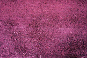 Background of a purple porous surface. The texture of the purple surface. Purple color surface for design