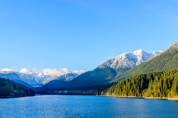 Snow Mountains and Capilano Lake in Vancouver British Columbia Pacific Northwest.
