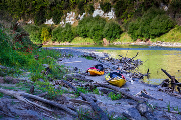 Kayaks on the Whanganui river bank