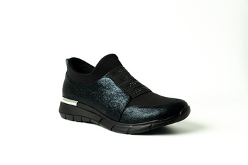 women's heeled shoes, flat sole sports shoes, patent leather shoes on a white background
