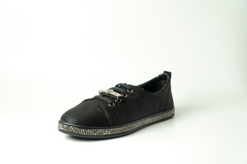 women's heeled shoes, flat sole sports shoes, patent leather shoes on a white background