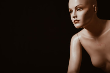 A sitting mannequin