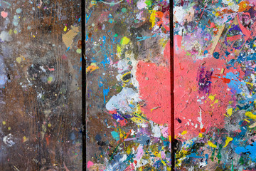 Art paint background of bright multi coloured and textured painted surface