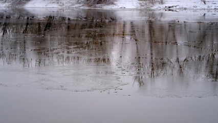  The first ice on the river. Winter background for your design.