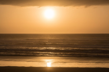 Naklejka premium Sonnenuntergang am Muriwai Beach, Auckland