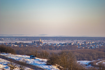 Winter city houses in haze