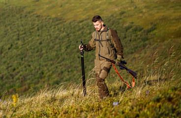 Hunt hunting rifle. Hunter man. Hunting period. Male with a gun. Close up. Hunter with hunting gun...