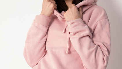 Girld in a pink hoodie