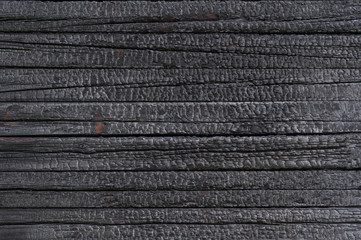 The texture of heavily burnt wooden boards