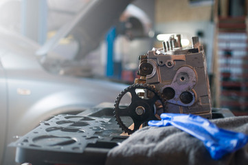 cylinder head before installation on a car in a workshop