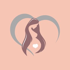 Silhouette of a young pregnant woman