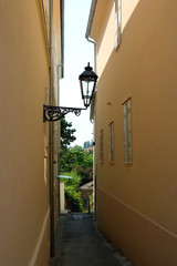 Vintage lamp in narrow alley in uptown Zagreb, Croatia.