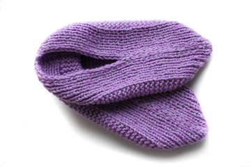 Handmade knitted pink slippers. On white background you can easily place text or change the background