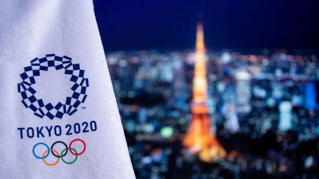 TOKYO, JAPAN, FEBRUARY. 14. 2020: Summer Olympic Game Background, Tokyo City In The Night, Olympic Logo Tokyo 2020 On White Background