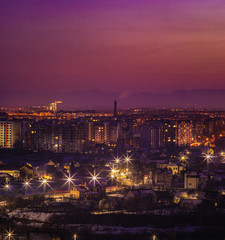 Fototapeta premium Beautiful sunset sky over the evening city