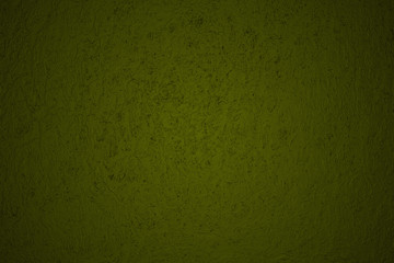 Dark green-yellow stucco wall