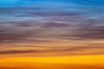 Naklejka na ściany i meble Panorama of beautiful colorful clouds in the sunset sky