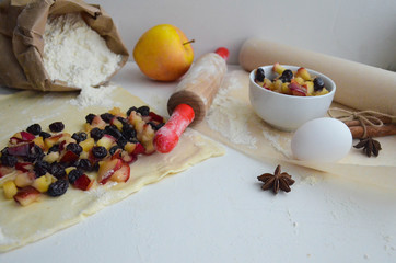 Preparing apple and cinnamon strudel