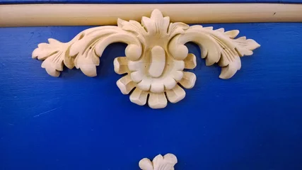 Fotobehang Oude meesters Ornament of the antique vintage wooden frame on the wall background in classic blue color with azure after restoration. Decor Elements. Design interior. Artistic 3d wood milling. Copy space for text.  © NVS my world