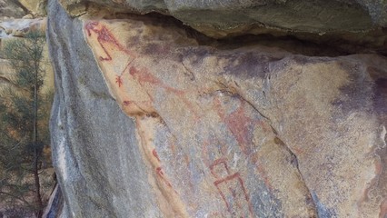 Native Rock Art Drawings on Rock Wall