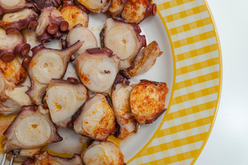 Octopus dish cooked in the style of Galicia and artisan bread. Pulpo a Feira.