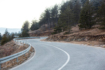 Mountain road leading across the hill