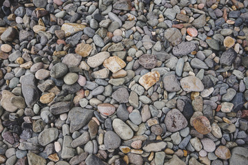 Colored stones on the beach. Mate Version