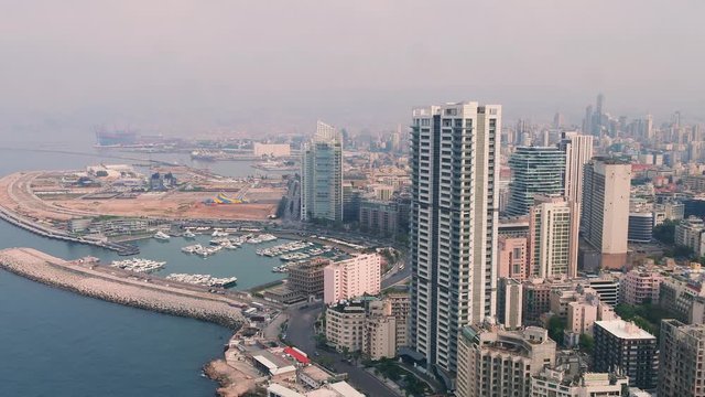 Beirut's Zaytouna Bay sea front with high rise residential buildings and pedestrian walkway along the Mediterranean sea, Lebanon
