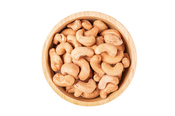 Roasted cashew nuts in a bowl isolated on white background