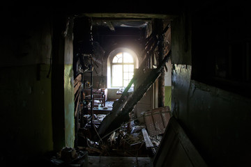 Burned interiors after fire in industrial or office building. War or fire consequences concept