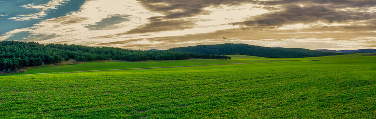 Fototapeta na wymiar panorama of green meadows in the highlands, spain
