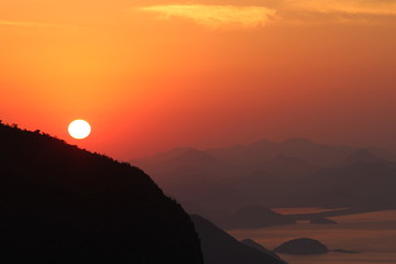 focused and high sun fading its sunshine