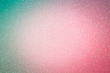 Shining pink and green background, abstract glitter paper