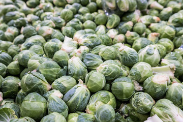 Fototapeta na wymiar Brussels sprouts background. Farmer Market with fresh vegetables