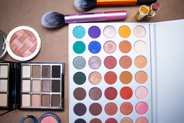 Makeup studio with all the accessories such as shadow palettes, concealers, makeups, eyeliners,...