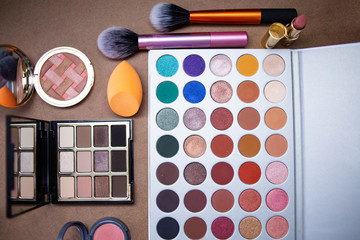 Makeup studio with all the accessories such as shadow palettes, concealers, makeups, eyeliners,...